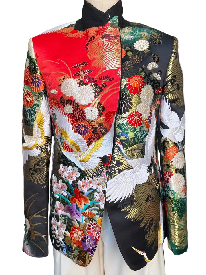 Front view of MIDNIGHT GARDEN KIMONO JACKET with Black satin lapel. Detail of gold embroidered cranes on vintage uchikake silk. Nigel Curtiss GARDEN KIMONO JACKET Nigel Curtiss