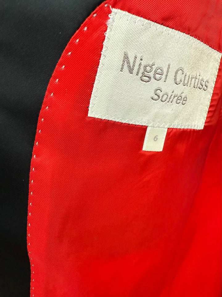 Red silk interior of the MIDNIGHT GARDEN KIMONO JACKET Nigel Curtiss